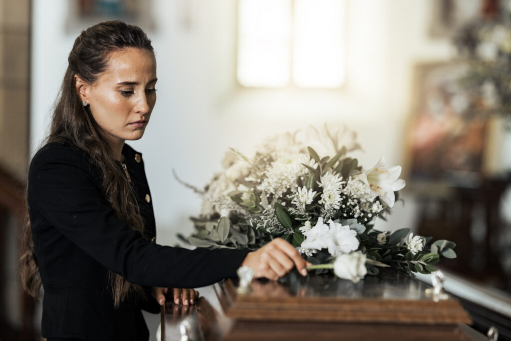 Should a woman carry a coffin?